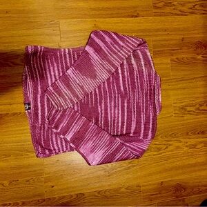 This is a cotton zip up sweater with pockets. Mauve and light pink striped.